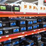 Going to an automotive service center to ask the price of car battery