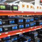 Going to an automotive service center to ask the price of car battery