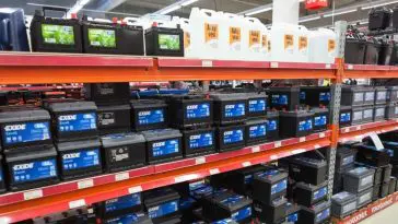 Going to an automotive service center to ask the price of car battery