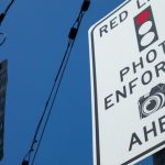 You will be told that there will be a red light camera ahead of you