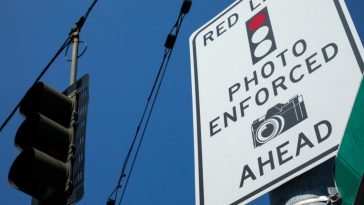 You will be told that there will be a red light camera ahead of you