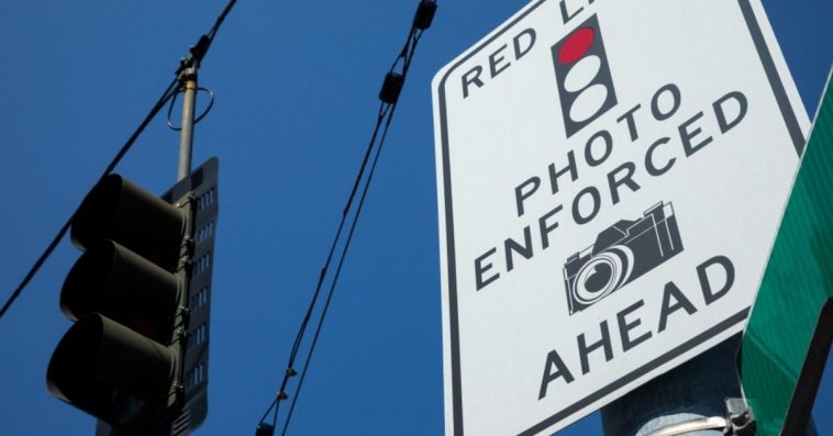 You will be told that there will be a red light camera ahead of you