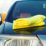 Removing old wax from my vehicle outside of my house