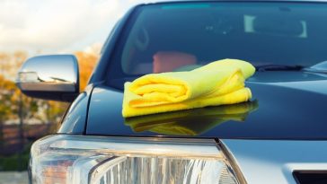 Removing old wax from my vehicle outside of my house