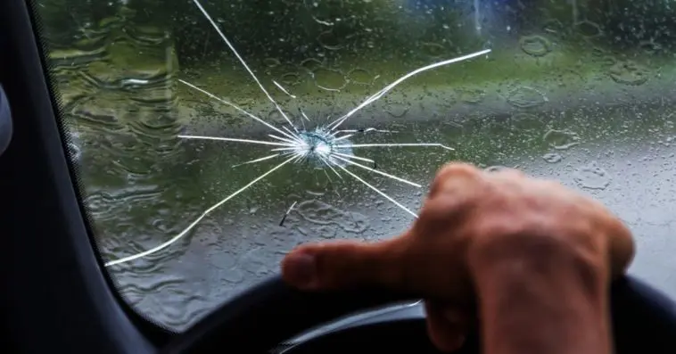 Driving a car with a cracked windshield may be a danger of breaking glass, that's needed to be fixed