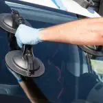 Changing a car windshield at an auto repair shop and wonder how long it will take to get done