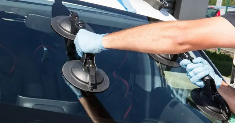 Changing a car windshield at an auto repair shop and wonder how long it will take to get done