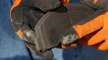 Checking the thickness of your brake pads at an auto repair shop