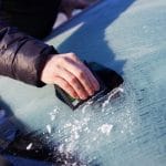 Getting rid of ice on my windshield when I go to work