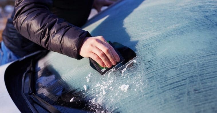 Getting rid of ice on my windshield when I go to work