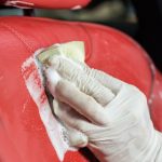 Cleaning my leather car seats with a cleaner while having a spare time