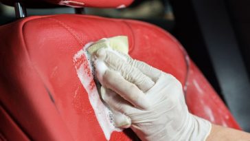 Cleaning my leather car seats with a cleaner while having a spare time