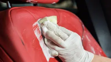 Cleaning my leather car seats with a cleaner while having a spare time