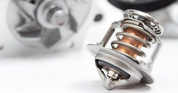what does a car thermostat do