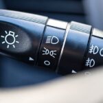 How can I tell if my headlights are on high beam or low beam?