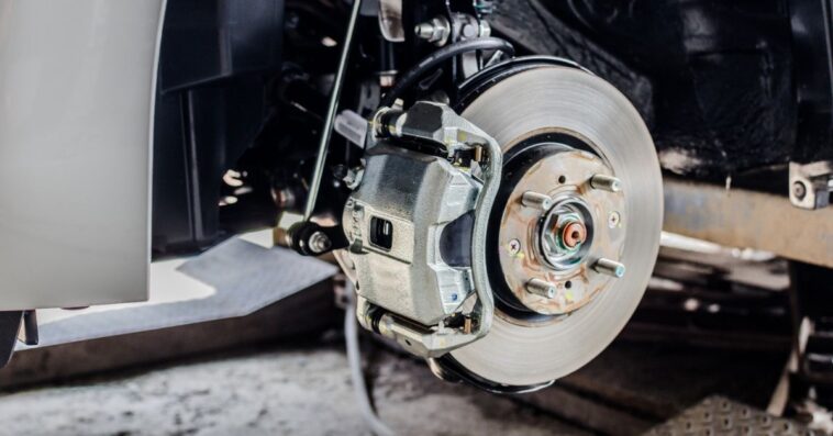 What should I use to compress the brake caliper? Are there any tools that I will have to use?